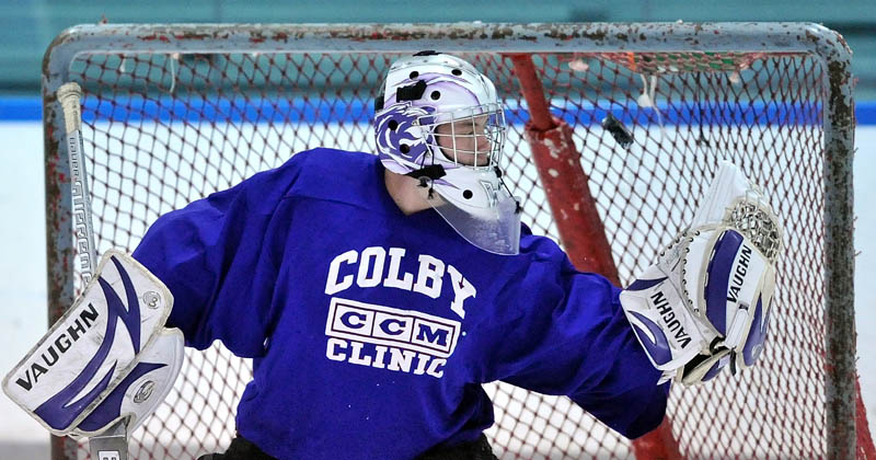 Staff photo by David Robinson Waterville Senior High School goalie Cody Thibodeau, practices with teammates during practice at Alfond Arena at Colby College in Waterville Tuesday.