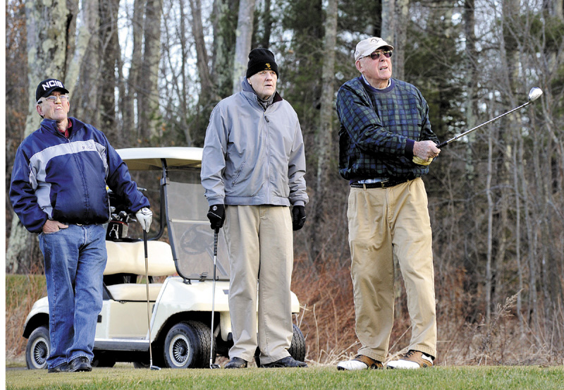 CHIP SHOT: From left, Ron Henderson of South Portland, Larry Bell of Scarborough and Jim Mountain of South Portland enjoy a rare December day golfing Wednesday in 45 degree weather at Nonesuch River Golf Course in Scarborough.