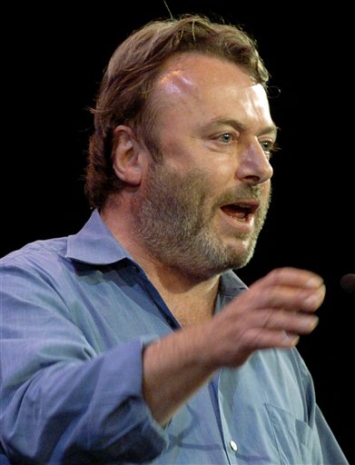 Essayist Christopher Hitchens speaks during a debate on Iraq and the foreign policies of the United States and Britain, in this Sept. 14, 2005 file photo taken in New York. Vanity Fair reports Hitchens died on Thursday Dec. 15, 2011 at the age of 62 from complications of cancer of the esophagus his magazine. The magazine reports he died in the presence of friends at the MD Anderson Cancer Center in Houston, Texas. (AP Photo/Chad Rachman)