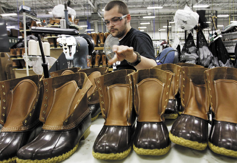 Eric Rego stitches boots in the facility where L.L. Bean boots are assembled in Brunswick.