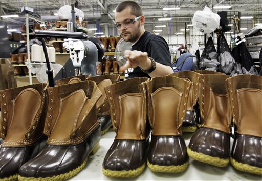 Eric Rego of East Boothbay stitches boots in the Brunswick facility.