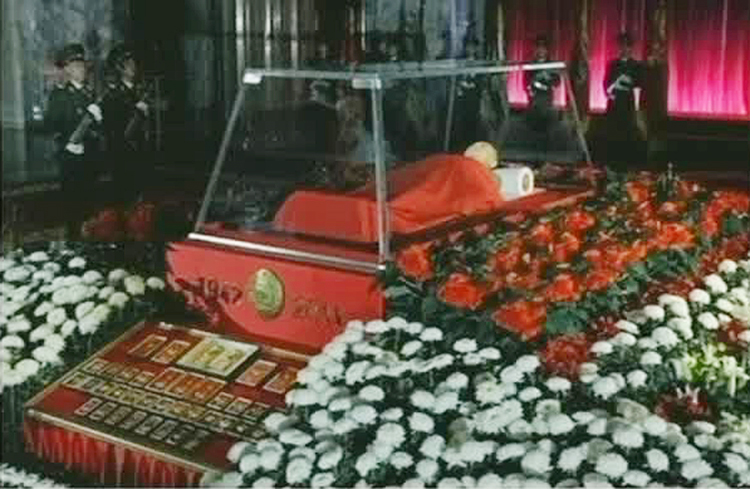 In this image made from KRT television, the body of North Korean leader Kim Jong Il lies in a memorial palace in Pyongyang today.