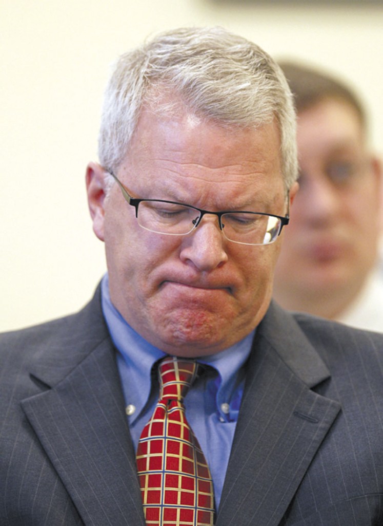In this April photo, Paul Violette, former executive director of the Maine Turnpike Authority, grimaces before appearing before the Legislature's Government Oversight Committee in Augusta.