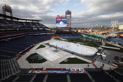 Crews work on the ice rink in preparation for NHL's Winter Classic at Citizens Bank Park on Wednesday in Philadelphia. The New York Rangers and the Philadelphia Flyers are scheduled to play on Monday.
