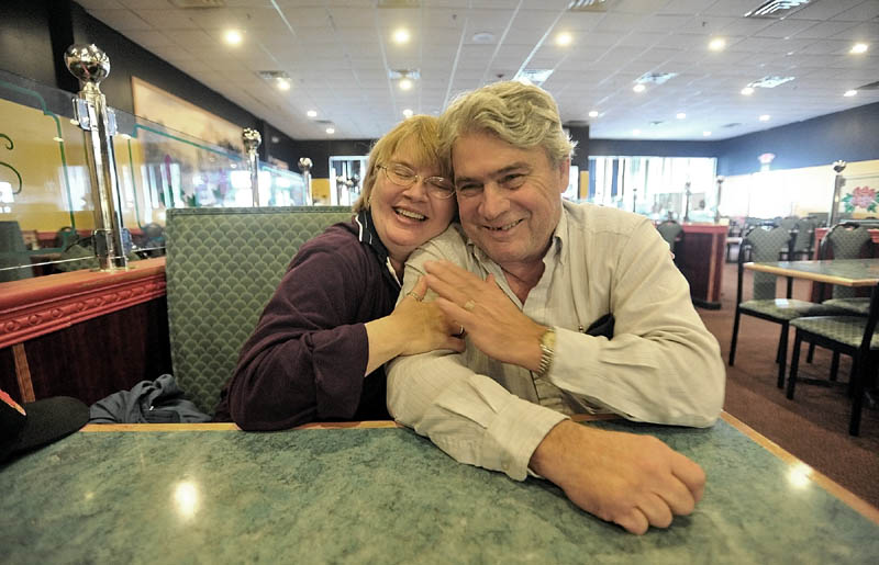 Staff photo by Michael G. Seamans Cheryl and Larry enjoy some down time at the Super Buffet in Waterville during an afternoon of respite time on October 4, 2011.Respite time is very important for Cheryl and Larry. They only get five hours a week away from home and Alice for their own personal time and a chance to let go of the daily responsibility of caring for Alice.