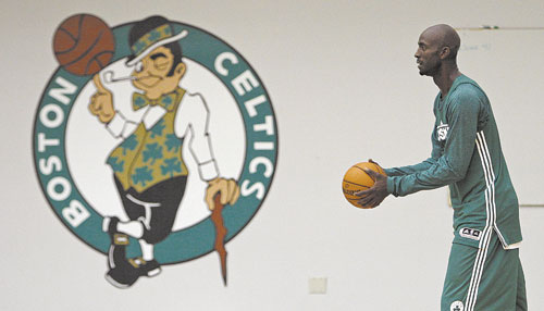 MAKING A MOVE? Boston Celtics forward Kevin Garnett sets to shoot during practice last week in Waltham, Mass.