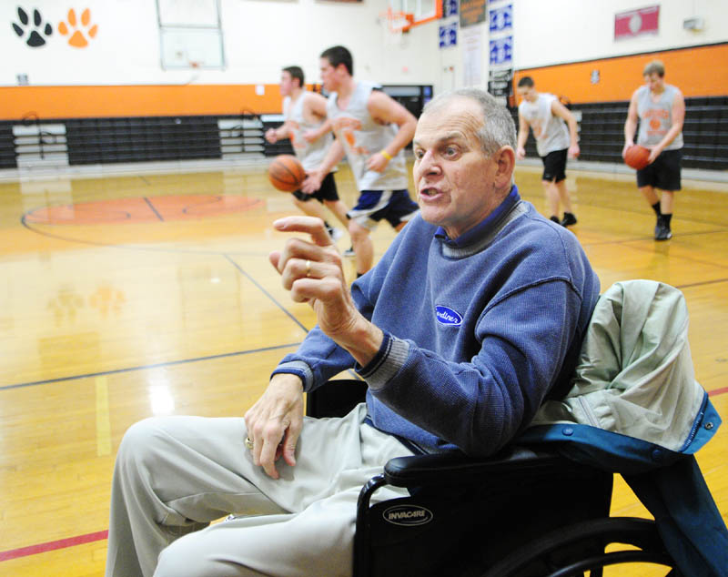 IN THE GAME: Art Warren answers questions during a interview held during Gardiner Area High School boys basketball practice recently in the John A. Bragoli Memorial Gym in Gardiner. Warren, a long-time coach and educator in Gardiner, was diagnosed with ALS a year ago.