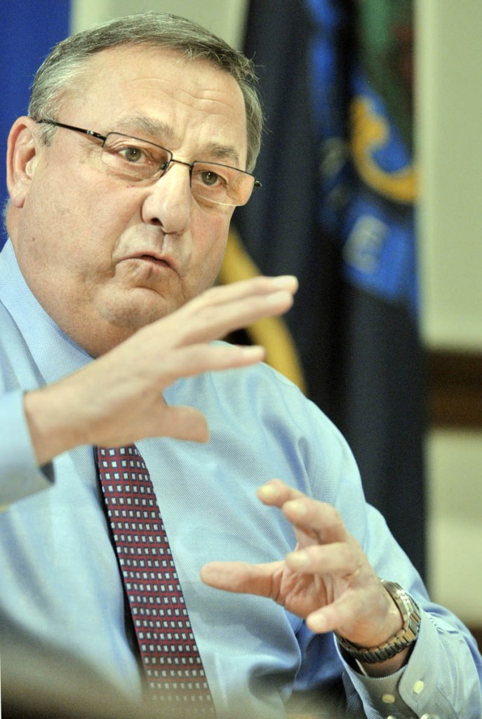 Gov. Paul LePage answers questions during a news conference on Thursday in the State House in Augusta.