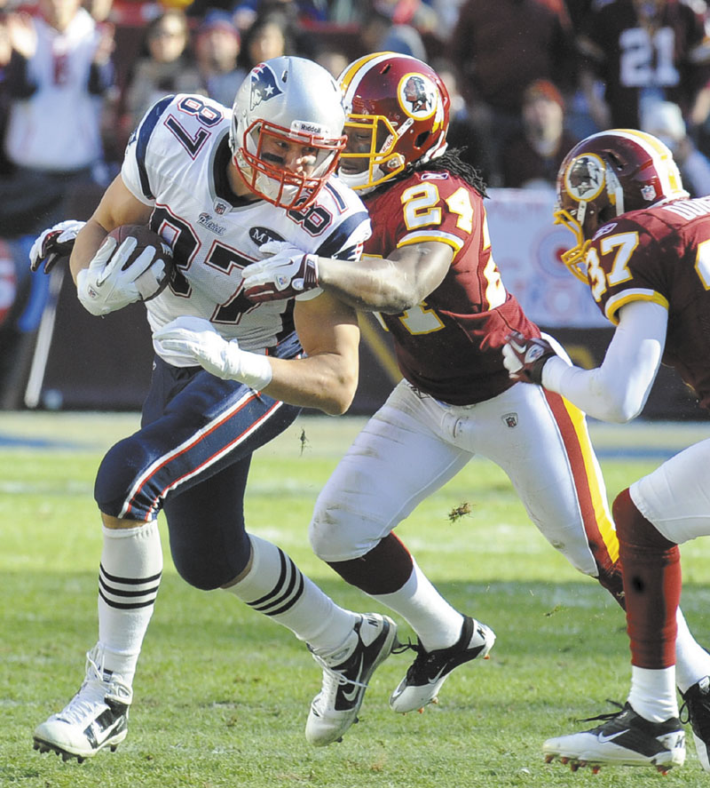 POWER HOUSE: Tight end Rob Gronkowski, left, and the New England Patriots will be one of the toughest test of the season for Tim Tebow and the Denver Broncos. Denver has a history of starting slow this season, which could hurt them in the long run against the high-scoring Patriots’ offense NFLACTION11;