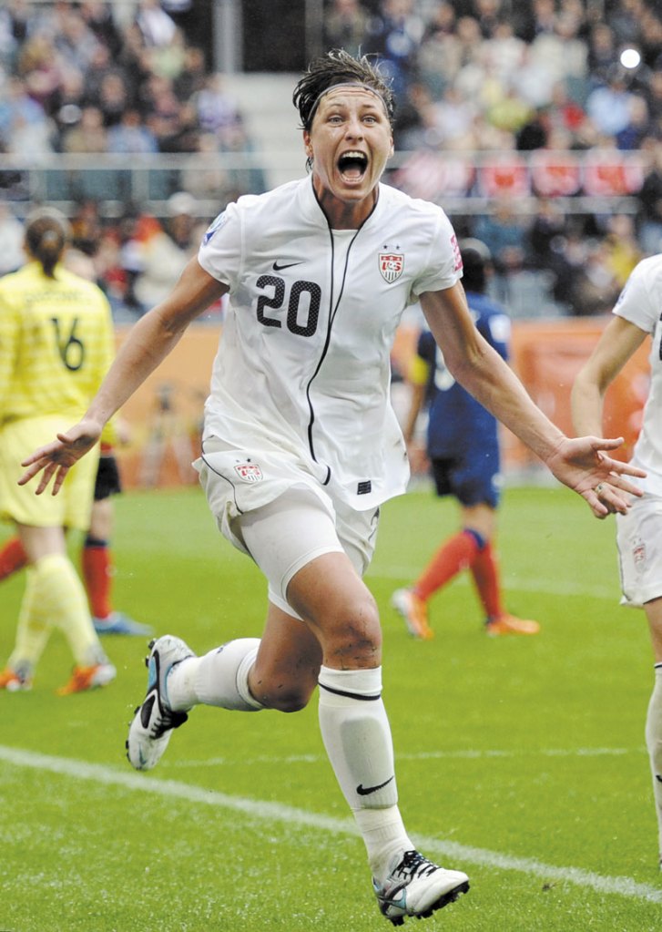 WHAT A MOMENT: Abby Wambach celebrates after scoring a goal in the United States women’s soccer team’s semifinal match against France in the World Cup earlier this year. Wambach, whose thunderous header in the final seconds of the World Cup quarterfinals led the U.S. to an improbable victory and sparked a nationwide frenzy rarely seen for women’s sports, has been voted the 2011 Female Athlete of the Year.