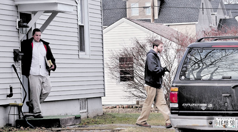 RETURN MY DAUGHTER: Justin DiPietro, right, leaves his mother’s home at 29 Violette Ave. in Waterville on Monday followed by his brother, Lance DiPietro. Justin DiPietro asked for the return of his daughter Ayla Reynolds, missing since Dec. 17, in an appearance on the “Today” show and an interview with the Morning Sentinel.