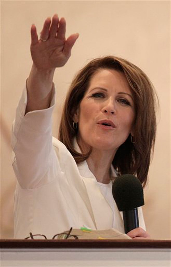 In this Jan. 1, 2012 photo, Rep. Michele Bachmann, R-Minn., speaks at Jubilee Family Church in Oskaloosa, Iowa. Bachmann told The Associated Press on Wednesday she'll seek a 4th term in Congress. (AP Photo/Charlie Riedel)