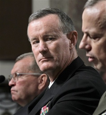 Navy Vice Adm. William H. McRaven, center, is seen on Capitol Hill in Washington. As traditional military operations are cut back, the Pentagon is moving to expand the worldwide reach of the U.S. Special Operations Command to strike back wherever threats arise. U.S. officials say the Pentagon and the White House have embraced a proposal by special operations chief Adm. Bill McRaven to push troops that are withdrawing from war zones to reinforce special operations units in areas somewhat neglected during the decade-long focus on al-Qaida. At left is Gen. James D. Thurman, nominee to become commander of U.S. forces in Korea. (AP Photo/J. Scott Applewhite)