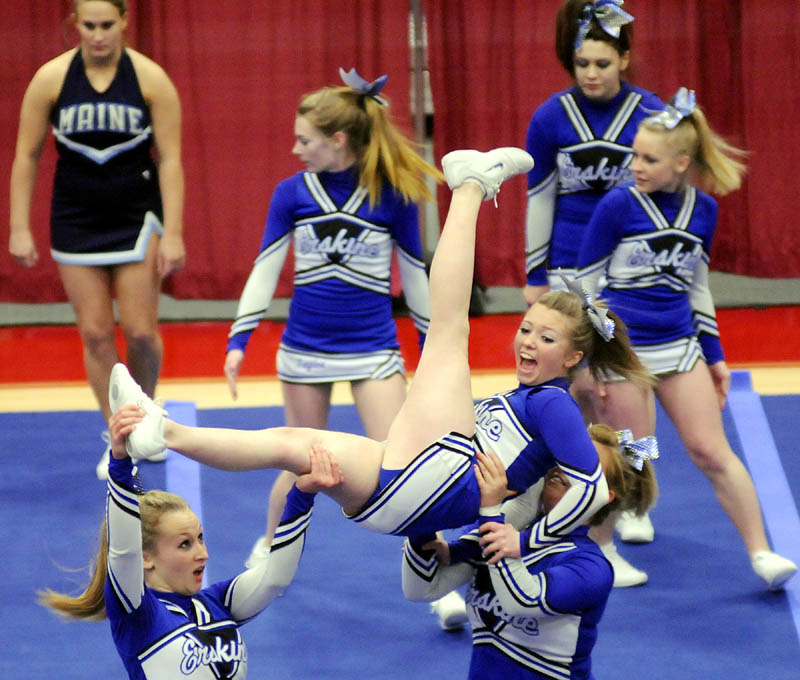 CATCH ME: The Erskine Academy cheerleaders compete in the Kennebec Valley Athletic Conference cheering championship Monday in Augusta. The Eagles finished in 11th place in Class A.