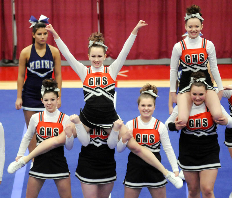 HERE WE COME: The Gardiner Area High School cheerleaders perform a stunt in the Kennebec Valley Athletic Conference cheering championship Monday in Augusta. The Tigers finished sixth in Class B.