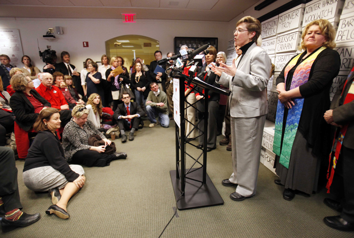 Betsy Smith, executive director of EqualityMaine, speaks at the State House news conference Thursday. “This denial of marriage continues to be a very painful part of our lives. The need for marriage has not gone away since 2009,” she said.