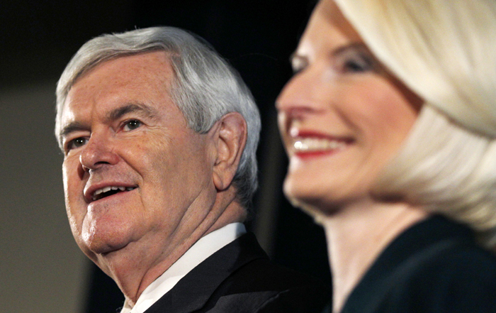 Republican presidential candidate Newt Gingrich, accompanied by his wife Callista, makes a campaign stop in Manchester, N.H., today.
