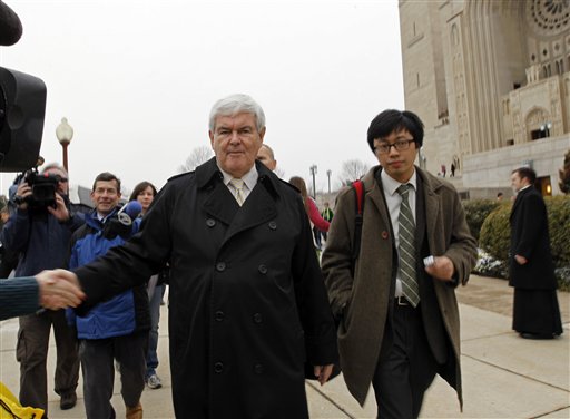Newt Gingrich is greeted by supporters after Mass at the Basilica of the National Shrine in Washington on Sunday.
