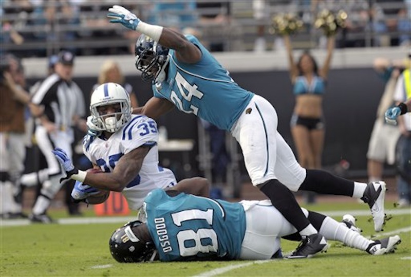 Jacksonville Jaguars' Montell Owens (24) makes a tackle during a Jan.1, 2012, NFL football game against the Indianapolis Colts. (AP Photo/Phelan M. Ebenhack) NFLACTION11;