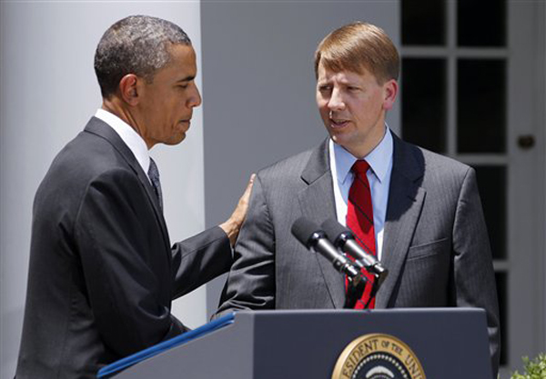 FILE - In this July 18, 2011 file photo, President Barack Obama shakes hands with former Ohio Attorney General Richard Cordray after announcing his nomination to serve as the first director of the Consumer Financial Protection Bureau (CFPB), in the Rose Garden of the White House in Washington. Senior administration officials tell The Associated Press that President Barack Obama will use a recess appointment to name Richard Cordray on Wednesday as the nation�s chief consumer watchdog despite steep Republican opposition. (AP Photo/Manuel Balce Ceneta, File)