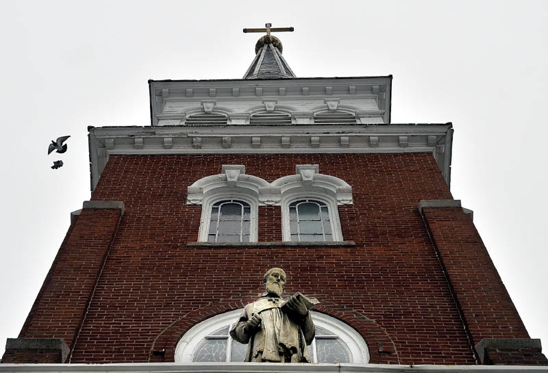 St. Francis de Sales Catholic Church on Elm Street in Waterville will be demolished in spring or early summer to make way for a 40-unit elderly housing facility.