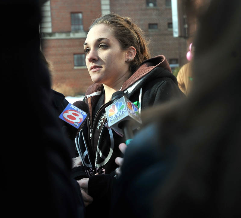 Staff photo by Michael G. Seamans Trista Reynolds talk with media during a vigil in Castonguay Square in Waterville for her missing toddler, Ayla Reynolds Saturday.