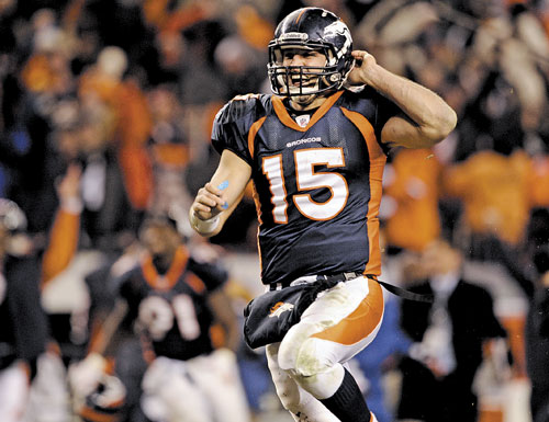 WINNING TD: Denver Broncos quarterback Tim Tebow celebrates his 80-yard touchdown pass in overtime, giving the Broncos a 29-23 win over the Pittsburgh Steelers on Sunday in Denver.
