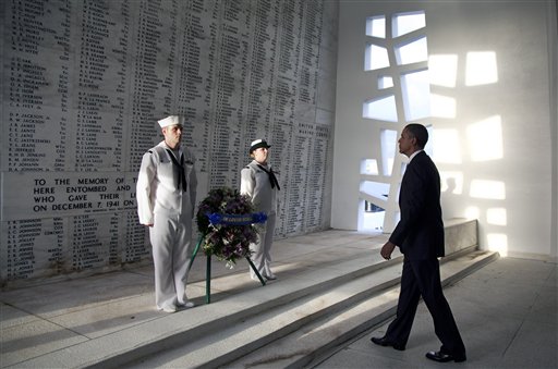 President Barack Obama participates in a wreath laying ceremony at the USS Arizona Memorial in Pearl Harbor on Dec. 29. (AP Photo/Carolyn Kaster) President Barack Obama participates in a wreath laying ceremony at the USS Arizona Memorial, part of the World War II Valor in the Pacific National Monument, Thursday, Dec. 29, 2011, in Pearl Harbor, Hawaii. (AP Photo/Carolyn Kaster)