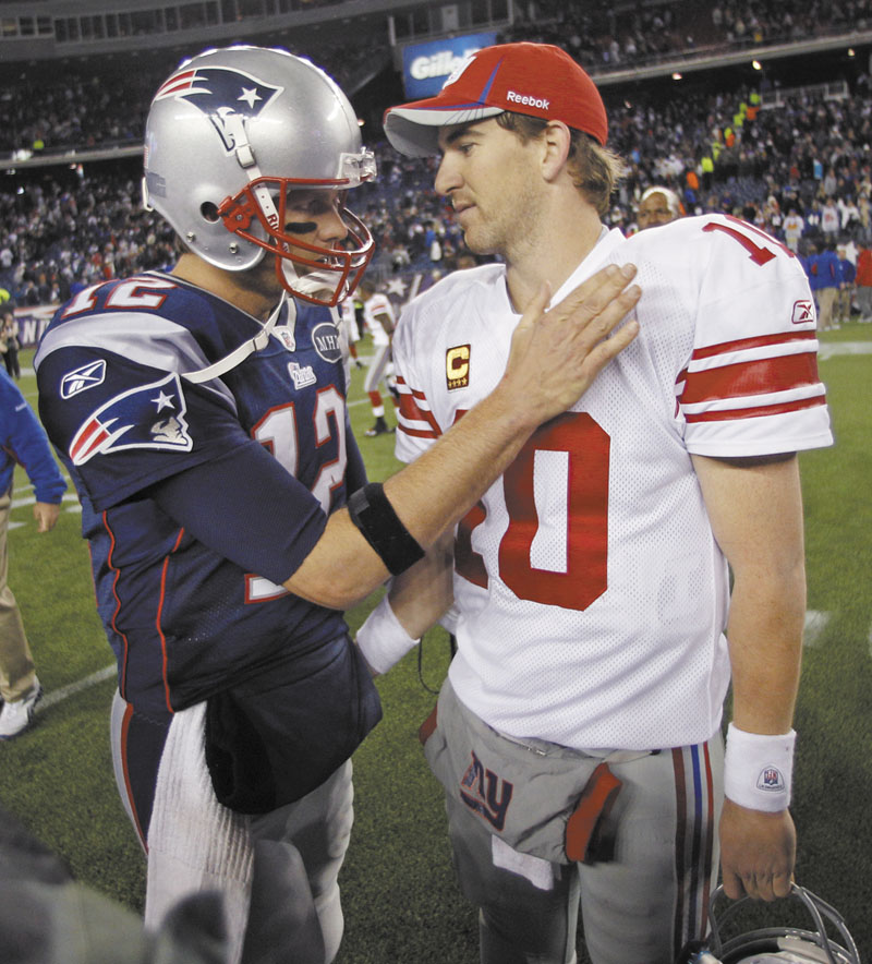 WINNERS: New England Patriots quarterback Tom Brady, left, has won three Super Bowls, while New York Giants quarterback Eli Manning, right, has won one.