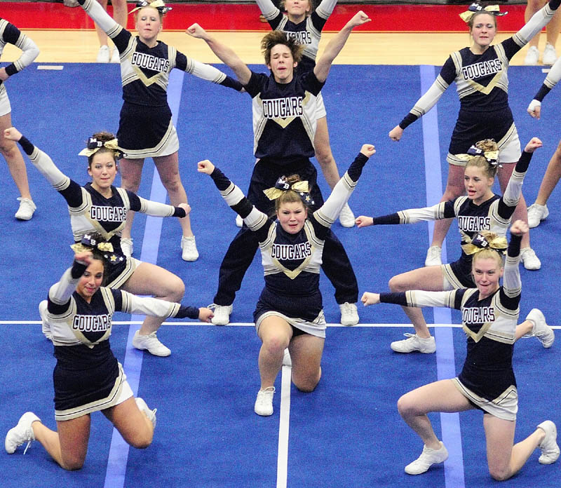 GIVE A CHEER: The Mt. Blue Cougars perform their routine during the Eastern Maine Class A cheering competition on Saturday night at the Augusta Civic Center.
