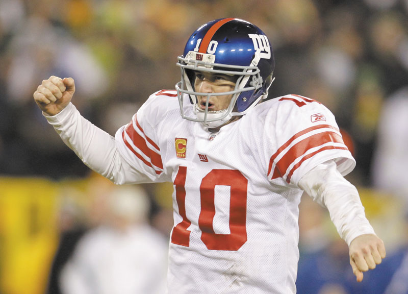 MOVING ON: New York Giants quarterback Eli Manning celebrates during the second half of the Giants’ 37-20 win over the Green Bay Packers in a NFC divisional round game Sunday in Green Bay, Wis.