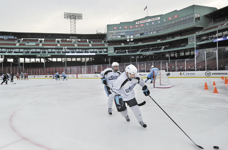 The University of Maine hockey team practices at Fenway Park in Boston on Friday, to prepare for Saturday's game vs. UNH at the historic ballpark in Boston.