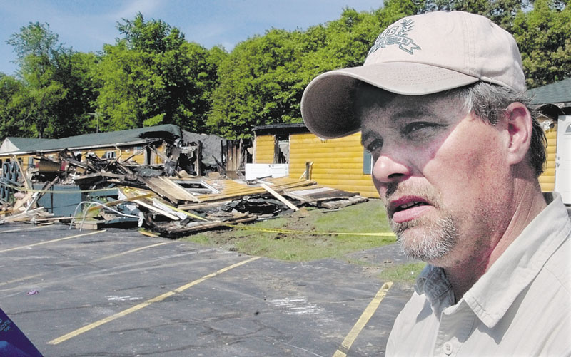 Former Grandview Topless Coffee Shop owner Donald Crabtree, seen here after his business burned down, questions whether authorities convicted the right man for the arson.