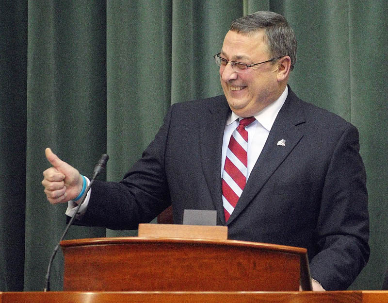 Gov. Paul LePage gestures near the end of his first State of The State address to a joint session of the Maine House and Senate on Tuesday night at the State House in Augusta.