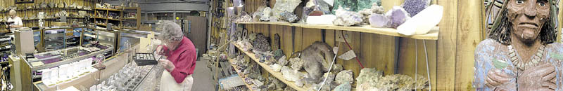 This April 2001 file photo shows Leon "Sonny" Chavarie, left, and Priscilla Chavarie in the Winthrop Gem and Mineral Shop, which they operated then in a renovated garage. priscilla chavarie sonny chavarie business wintrhop