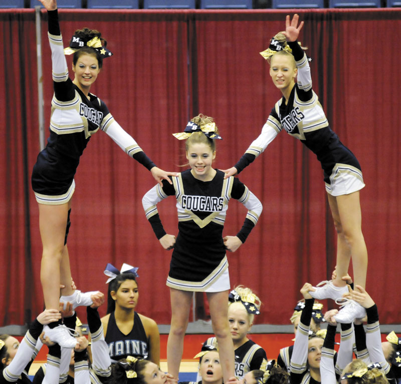 GIVE US AN M: The Mt. Blue cheerleaders finished fifth at the at the Kennebec Valley Athletic Conference Class A Cheerleading Championship on Monday at the Augusta Civic Center.