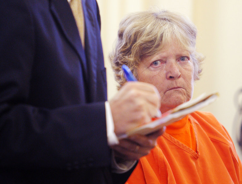 Carol Field listens to her attorney during an Oct. 4, 2011, bail hearing at York County Superior Court in Alfred.