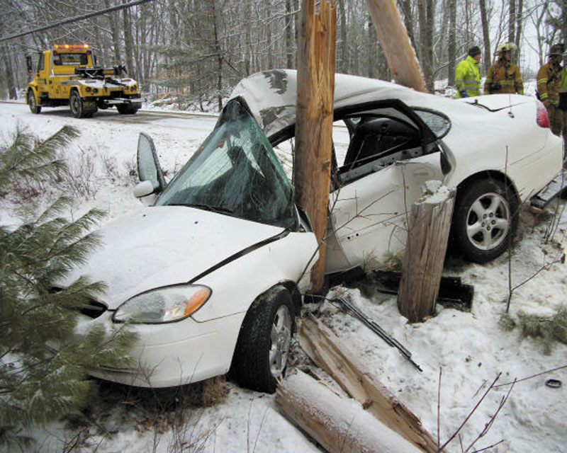 A car slid off Route 220 in Washington on Tuesday, crashing into a utility pole. The driver, a St. George teenager, was injured.