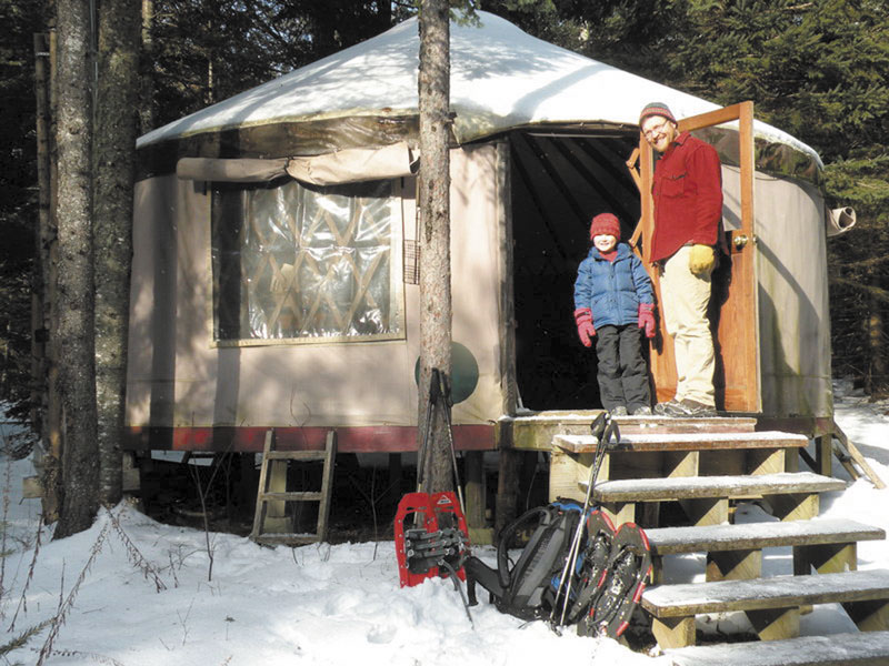 A PLACE TO STAY: Glen Widmer and his son, Isaac, stand outside the Goose Ridge Yurt in Montville. It offers overnight stays in the wilderness without needing to travel to the deep woods.