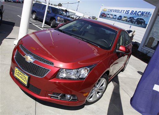 In this Aug. 30 photo, a 2011 Chevrolet Cruze is featured at a car dealership in San Jose, Calif. (AP Photo/Paul Sakuma)