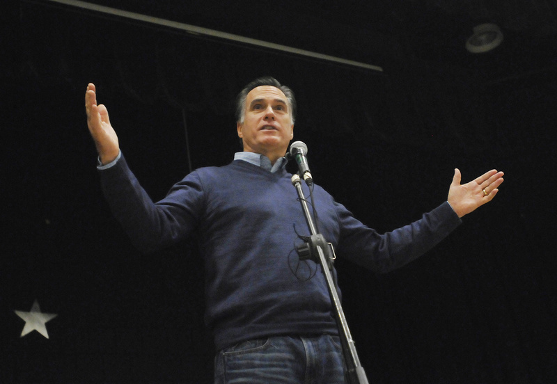 Mitt Romney, the former governor of Massachusetts who is seeking the GOP presidential nomination, speaks Saturday during the Portland Republican City Committee Caucus at Riverton Elementary School. The candidate added to his delegate count with a victory in Maine.