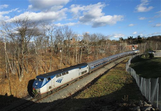 In this December 2011 photo, the Amtrak Downeaster travels through Portland. The train provides passenger rail service between Portland and Boston.