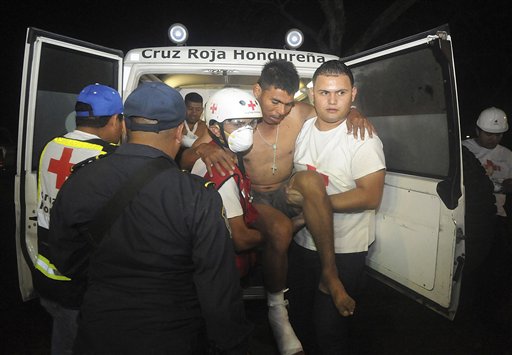 An inmate arrives at a hospital after fire broke out today at a prison in Comayagua, Honduras, a town 90 miles north of the Central American country's capital, Tegucigalpa.
