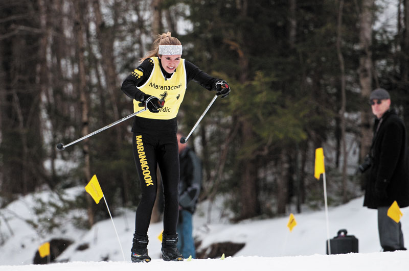 STRONG FINISH: Maranacook senior Abby Mace powers her way down the home stretch Saturday at Titcomb Mountain. Mace won the Kennebec Valley Athletic Conference girls freestyle title Wednesday and added the classical pursuit championship Saturday afternoon.