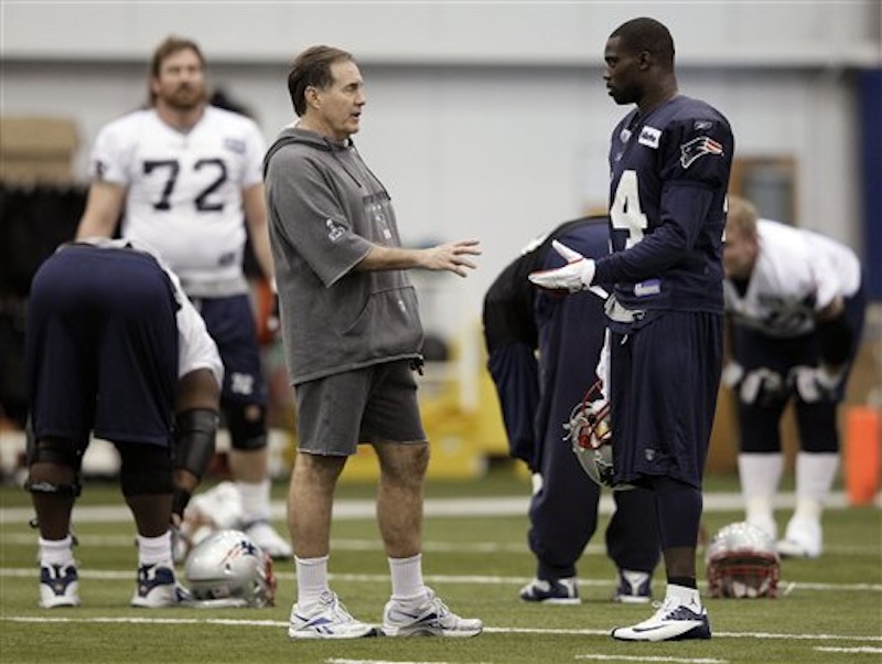 New England Patriots head coach Bill Belichick talks with strong safety James Ihedigbo (44) during practice on Thursday, Feb. 2, 2012, in Indianapolis. The Patriots will face the New York Giants in NFL football Super Bowl XLVI on Sunday. (AP Photo/Mark Humphrey)