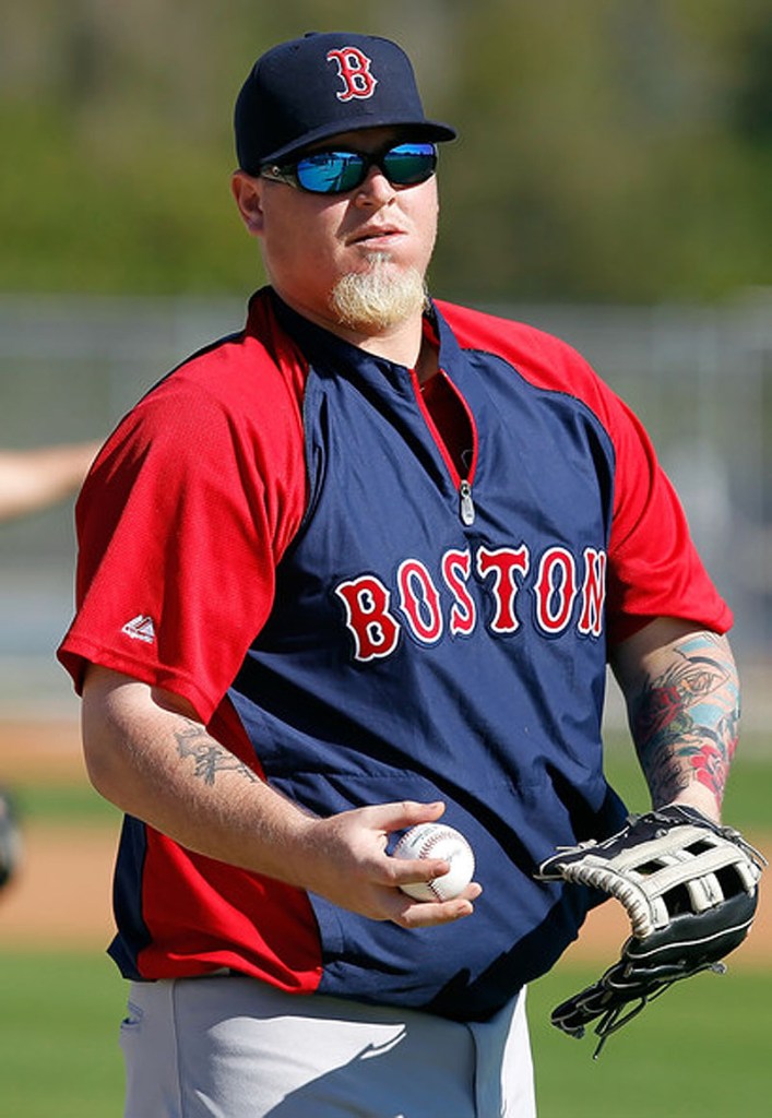 Boston Red Sox reliever Bobby Jenks throws during Spring Training in 2011. Jenks had a scary offseason this winter, which included multiple back surgeries and a life-threatening infection. (J. Meric / Getty Images)