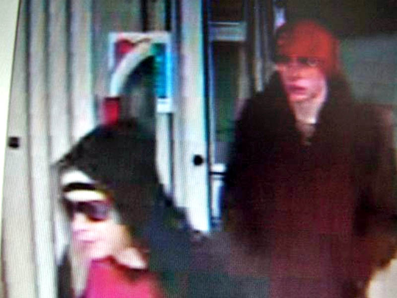 IN AUGUSTA: Police say these two are suspects in the robbery of a CVS.