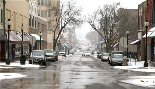 A light snow covers the streets of Muscatine, Iowa, today. China's likely future leader Xi Jinping will meet those who hosted him when he was a county official on a 1985 study tour.