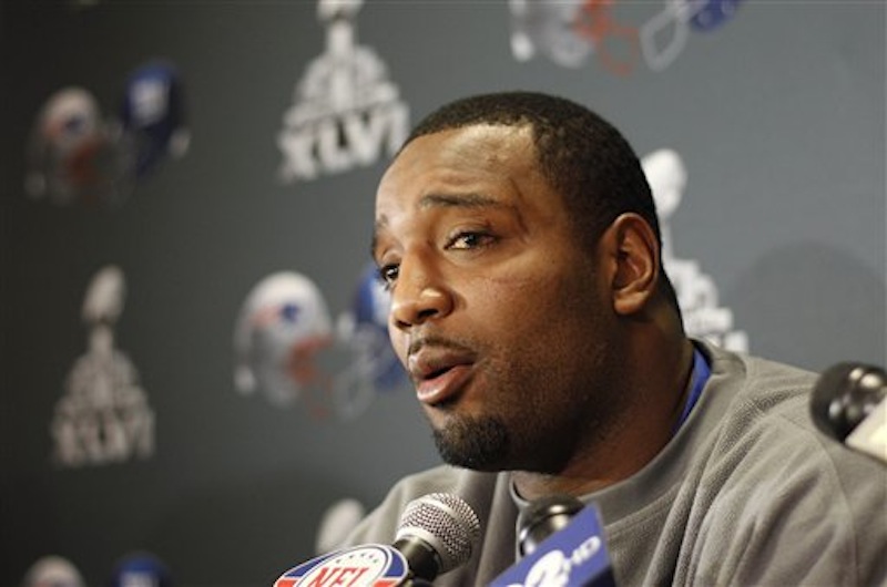 New York Giants' Chris Canty answers questions during a Super Bowl media availability on Thursday, Feb. 2, 2012, in Indianapolis. (AP Photo/Eric Gay)