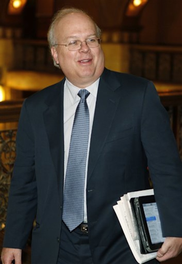 In this June 2011 photo, GOP strategist Karl Rove arrives at the Brown Palace Hotel in Denver, where he addressed Republicans at a fund raising luncheon. American Crossroads, the Republican "super" political committee that plans to play a major role in this year's presidential campaign, raised more than $51 million along with its nonprofit arm last year. (AP Photo/Ed Andrieski, File)